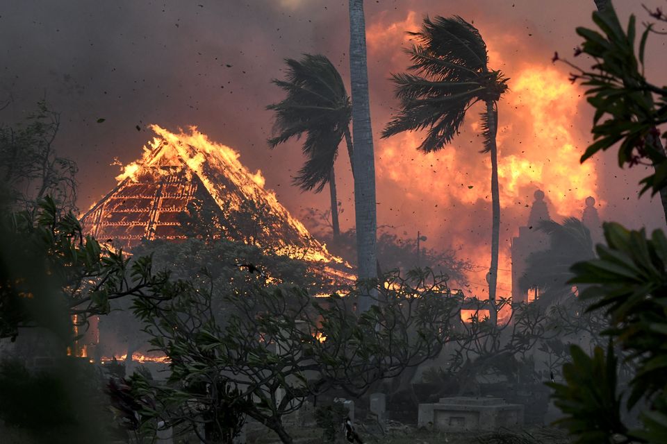 Waiola Church and nearby Lahaina Hongwanji Mission are engulfed in flames. (Matthew Thayer/AP)