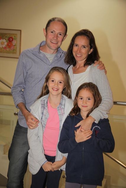 Phil Newby with wife Charlotte and daughters Jess and Sasha before he was diagnosed with MND (Family Handout/PA)