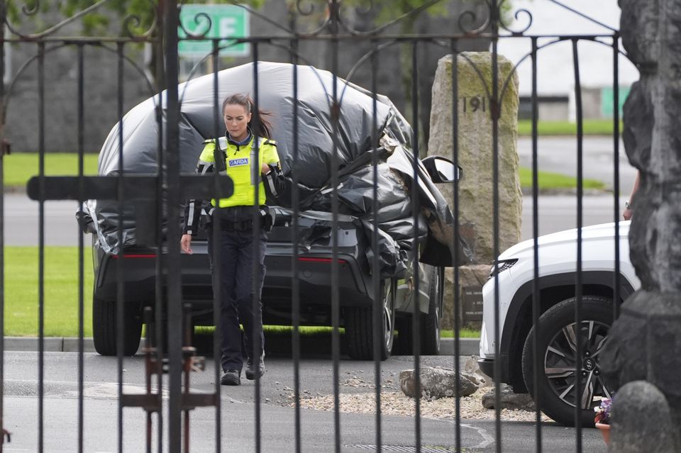 A car wrapped in plastic at the scene at Renmore Barracks in Co Galway (Brian Lawless/PA)