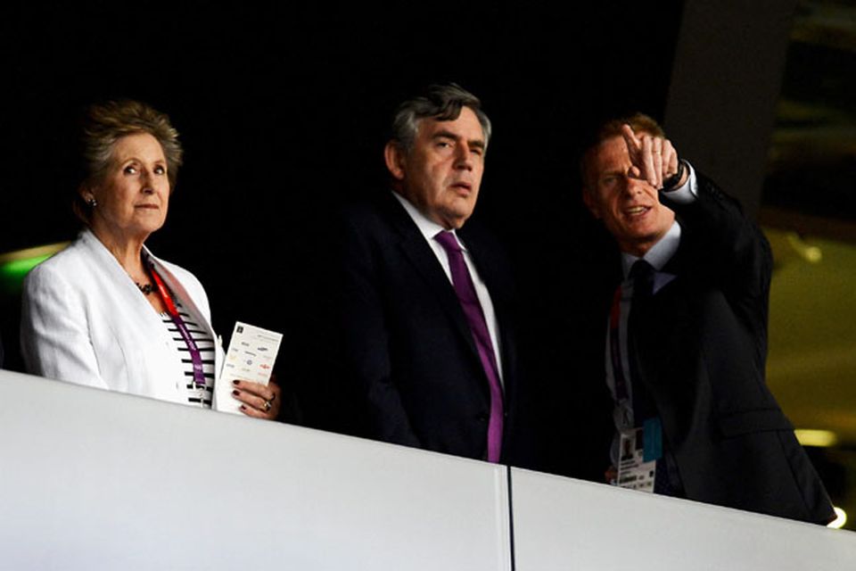LONDON, ENGLAND - JULY 27:  (L-R) Norma Major, Gordon Brown and Chief Executive of LOCOG Paul Deighton during the Opening Ceremony of the London 2012 Olympic Games at the Olympic Stadium on July 27, 2012 in London, England.  (Photo by Pascal Le Segretain/Getty Images)