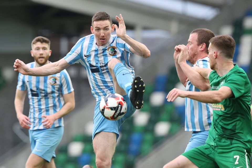 Immaculata and Crumlin Star in action at Windsor Park in the Intermediate Cup final