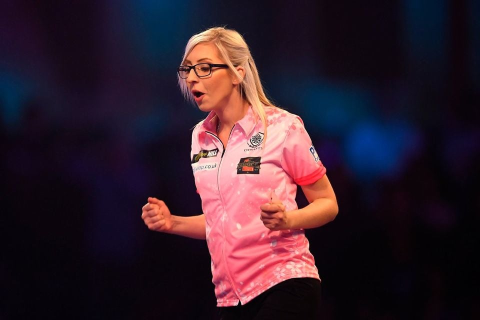 Female darts star beats a 2nd man at PDC World Championship