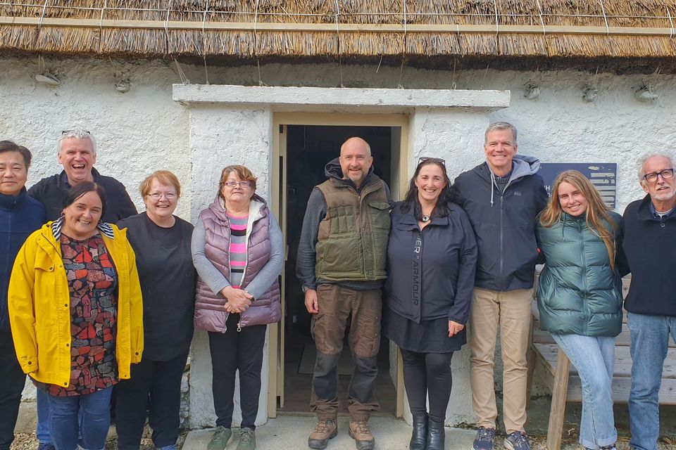 Folk Village staff with In the Land of Saints and Sinners producer Philip Lee (far left), director Robert Lorenz (third from right) and cinematographer Tom Stern (far right)