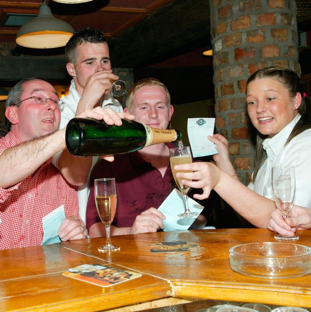 Friends of Michael Futter celebrate the Monty's Pass win in the Grand National at Pier 36 in Donaghadee