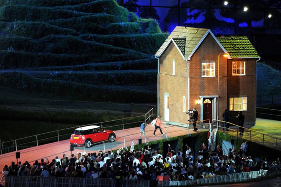 LONDON, ENGLAND - JULY 27:  Performers depict a scene of an ordinary family arriving home on a Saturday night during the Opening Ceremony of the London 2012 Olympic Games at the Olympic Stadium on July 27, 2012 in London, England.  (Photo by Michael Regan/Getty Images)