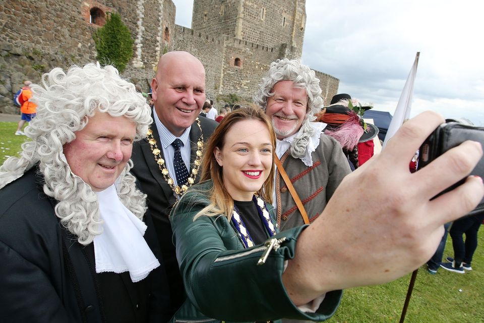 Press Eye - Belfast - Northern Ireland  - 13th July 2017 - 

Paul Reid, Mayor of Mid and East Antrim. Deputy Mayor Cheryl Johnston, David Hilditch MLA and Terry Clements take part in the re-enactment of the Siege of Carrickfergus Castle and the landing of King William at Castle Green, Carrickfergus. The event included re-enactment groups from across the Northern Oteland, all dressed in period costume followed by a Pageantry parade to meet King William upon his landing at Carrick Harbour.Ê

Photo by Kelvin Boyes / Press Eye.