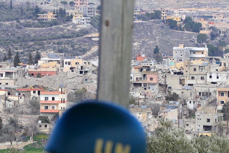 An UN peacekeeper takes position in Mays al-Jabal, southern Lebanon (Mohammed Zaatari/AP)