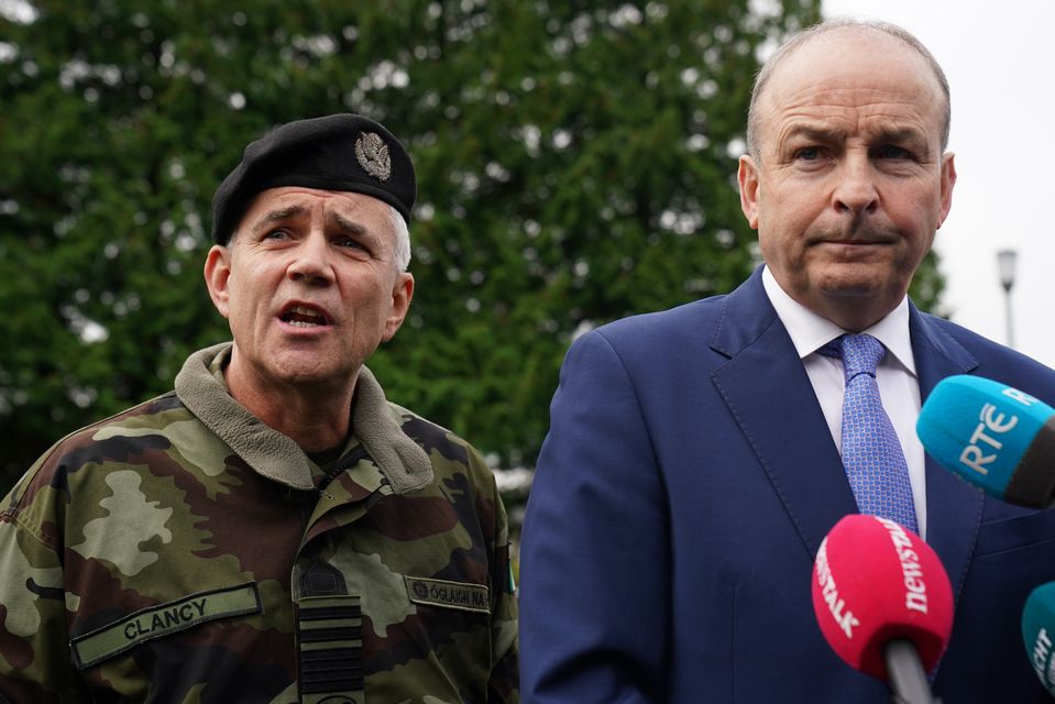 Tanaiste Micheal Martin and the Chief of Staff Lieutenant General Sean Clancy speak at Custume Barracks in Athlone, Co Westmeath (Brian Lawless/PA)