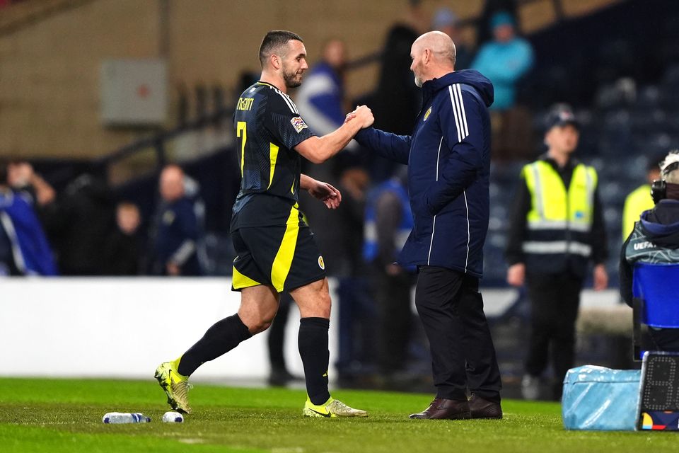 John McGinn, left, is congratulated by manager Steve Clarke after scoring Scotland’s winner (Andrew Milligan/PA)