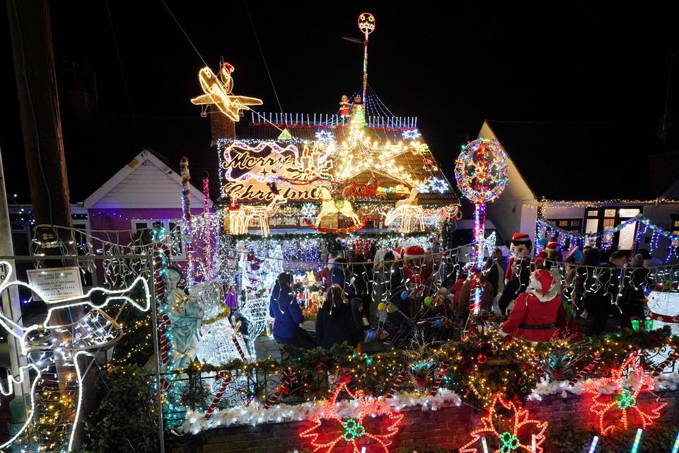 Peter Elliott and Lesley Haylett’s display of their Christmas lights (Jonathan Brady/PA)