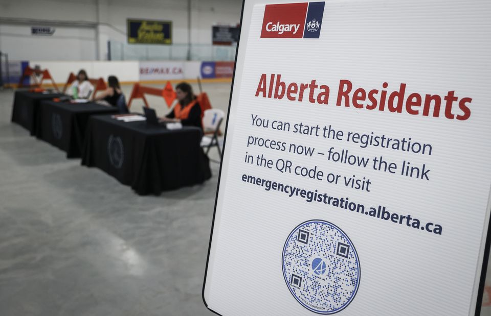 A reception centre is readied for wildfire evacuees forced from Jasper National Park (Jeff McIntosh/The Canadian Press via AP)