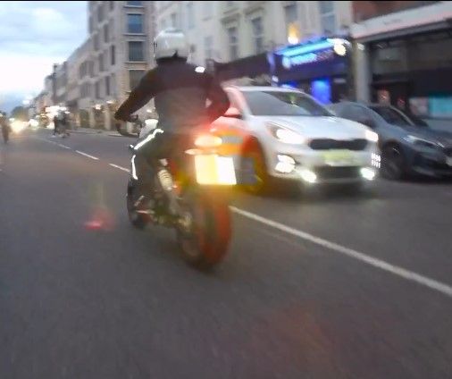 A photograph of the motorcyclist police want to speak to, captured from behind and taken just before the incident happened (Metropolitan Police/PA)