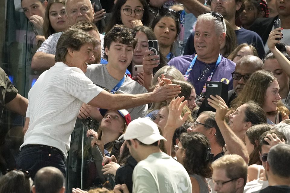 Actor Tom Cruise was mobbed by fans (Charlie Riedel/AP)