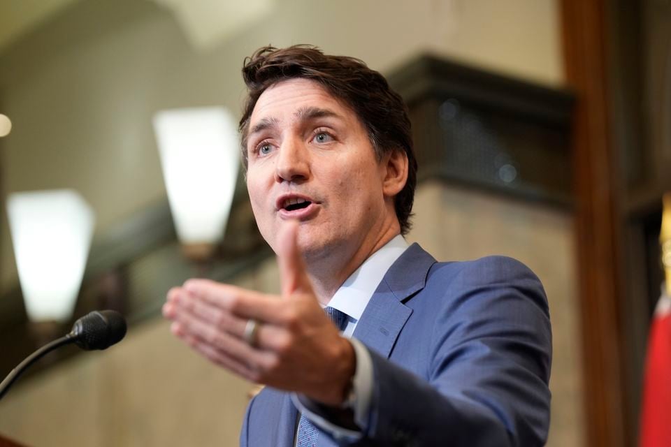 Prime Minister Justin Trudeau holds a news conference (Adrian Wyld/The Canadian Press via AP)