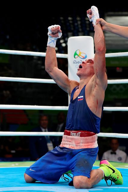 RIO DE JANEIRO, BRAZIL - AUGUST 16:  Vladimir Nikitin of Russia celebrates his victory over Michael John Conlan (not pictured) of Ireland in the boxing  Men's Bantam (56kg) Quarterfinal 1 on Day 11 of the Rio 2016 Olympic Games at Riocentro on August 16, 2016 in Rio de Janeiro, Brazil.  (Photo by Christian Petersen/Getty Images)