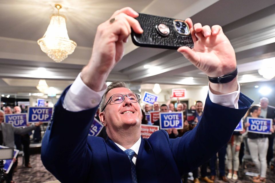 Jeffrey Donaldson takes a selfie with party faithful (Photo by Colm Lenaghan /Pacemaker)