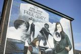 thumbnail: A Republican mural is seen on the side of a house in the Bogside are of Derry, the scene of the 'Bloody Sunday' shootings. 2005