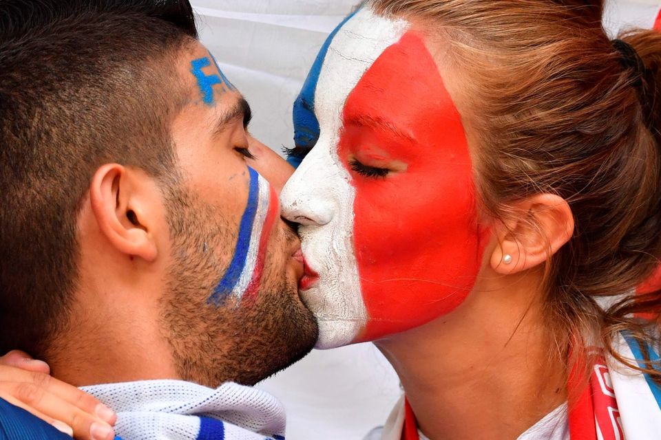 The beautiful game - football fans from around the world -  France supporters kiss prior to the Euro 2016 semi-final football match between Germany and France at the Stade Velodrome in Marseille on July 7, 2016.