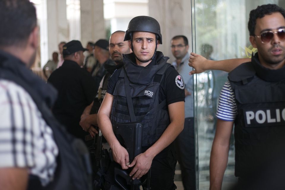 Tunisian police officers at a hotel in Sousse where a terrorist attack took place (AP)