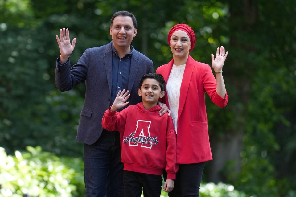 Anas Sarwar with his wife Furheen, and son Aliyan, eight (Andrew Milligan/PA)