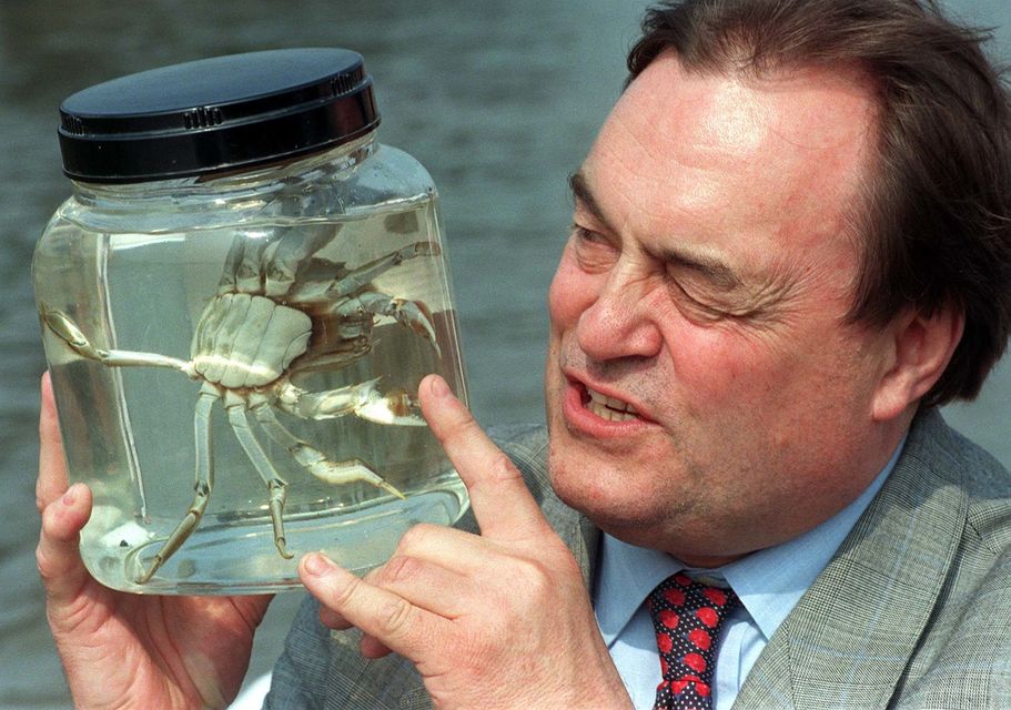 John Prescott taking a close look at a Chinese mitten crab (Ben Curtis/PA)