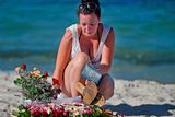 thumbnail: Holidaymakers lay flowers on Marhaba beach in Sousse, where 38 people were killed in last Fridays terror attack on June 30, 2015 in Sousse, Tunisia. British police have been deployed to the area in one of the biggest counter terror operations since the London bombings on 7 July 2005.  (Photo by Jeff J Mitchell/Getty Images)