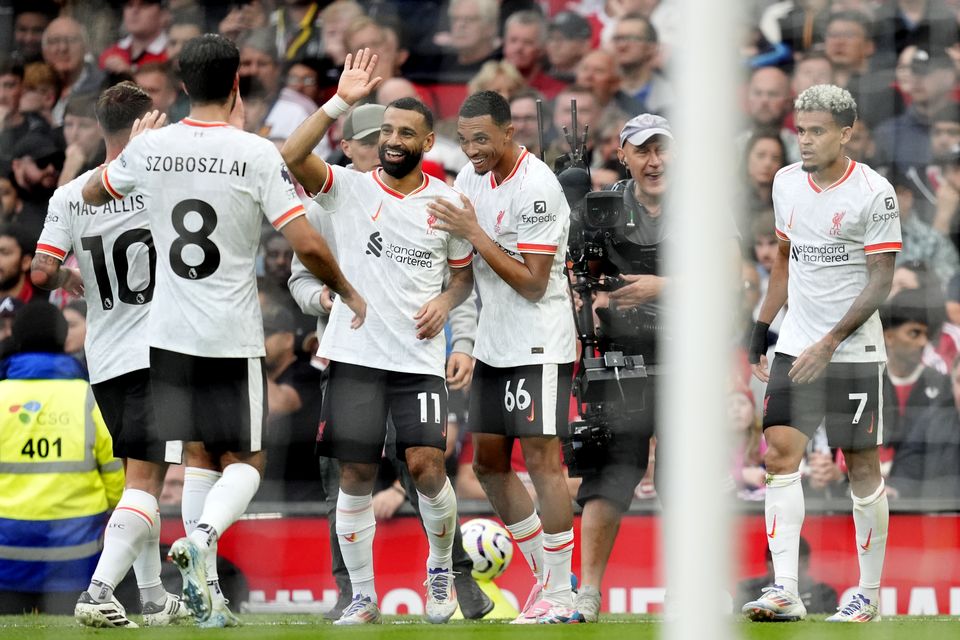 Mohamed Salah (centre) and Luiz Diaz (right) were on target in Liverpool’s win at Old Trafford (Nick Potts/PA)