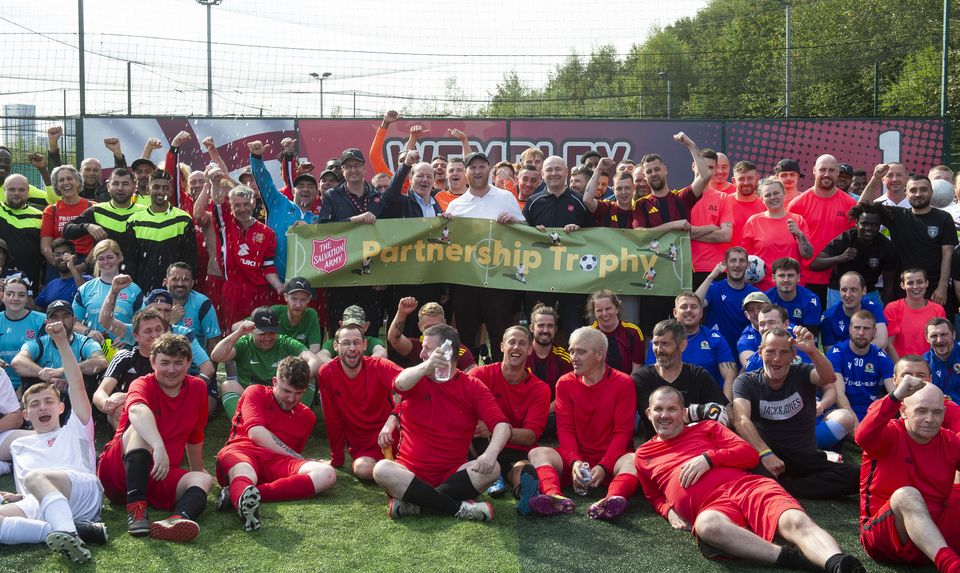 John Hartson presented the trophy to winning side The Orchard from Bradford. (Peter Powell/PA)