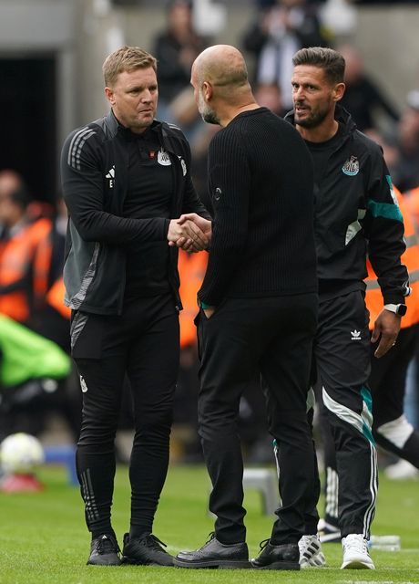 Eddie Howe and Pep Guardiola had a long exchange (Owen Humphreys/PA)