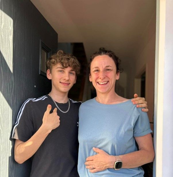 Jamie Holland with his mother Carrie (Darren Wiles/PA)