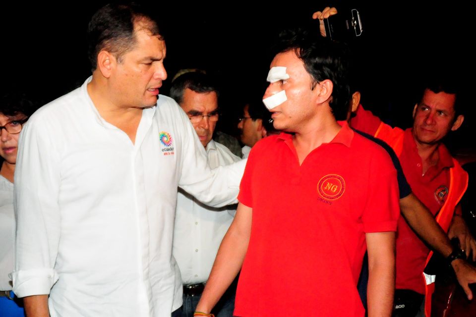 Picture released by Ecuadorean agency API showing Ecuador's President Rafael Correa (L) talking to a wounded man during his visit to the city of Manta, Ecuador, on April 17, 2016 a day after a powerful 7.8-magnitude quake hit the country.
Ecuador quake kills 272 and the number "will rise", Correa said. / AFP PHOTO / API / Ariel Ochoa / RESTRICTED TO EDITORIAL USE - MANDATORY CREDIT "AFP PHOTO / API / ARIEL OCHOA" - NO MARKETING NO ADVERTISING CAMPAIGNS - DISTRIBUTED AS A SERVICE TO CLIENTSARIEL OCHOA/AFP/Getty Images