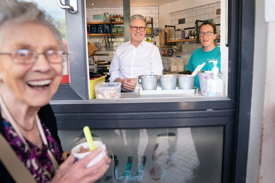 For Labour leader Sir Keir Starmer ice cream was on the menu as he served up some creamy cones alongside his key policy pledges to day trippers on Barry seafront in South Wales (Stefan Rousseau/PA)