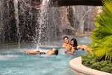 thumbnail: A family relaxing in the lazy river at the hotel