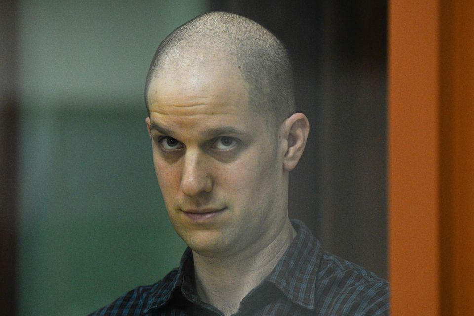 Wall Street Journal reporter Evan Gershkovich appeared in a glass cage in a courtroom at a previous hearing (AP)