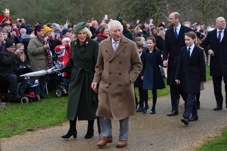 The King and Queen attend the Christmas Day service in Sandringham with the Princess of Wales, Prince Louis, Princess Charlotte, the Prince of Wales and Prince George walking behind them (Aaron Chown/PA)