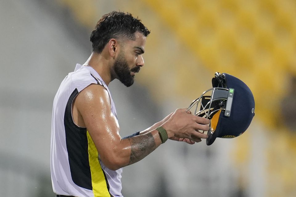 Virat Kohli, pictured, will be a team-mate of Bethell with Royal Challengers Bangalore next month (Aijaz Rahi/AP)