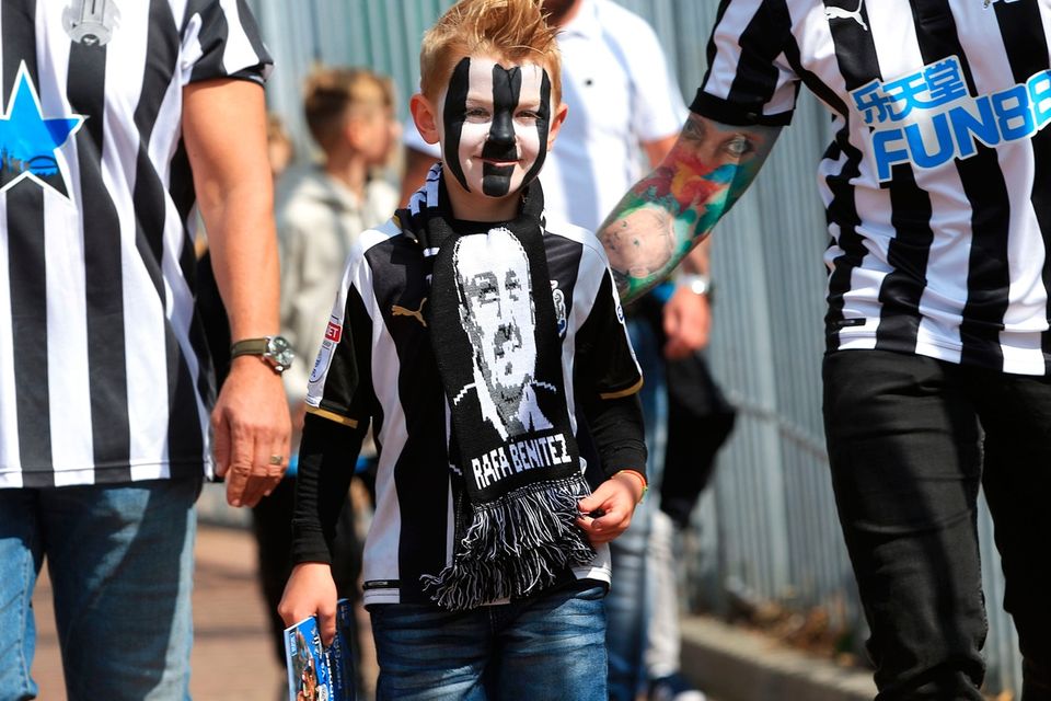 The beautiful game - football fans from around the world -  Newcastle United fans arriving before the Premier League match at the Kirklees Stadium, Huddersfield.