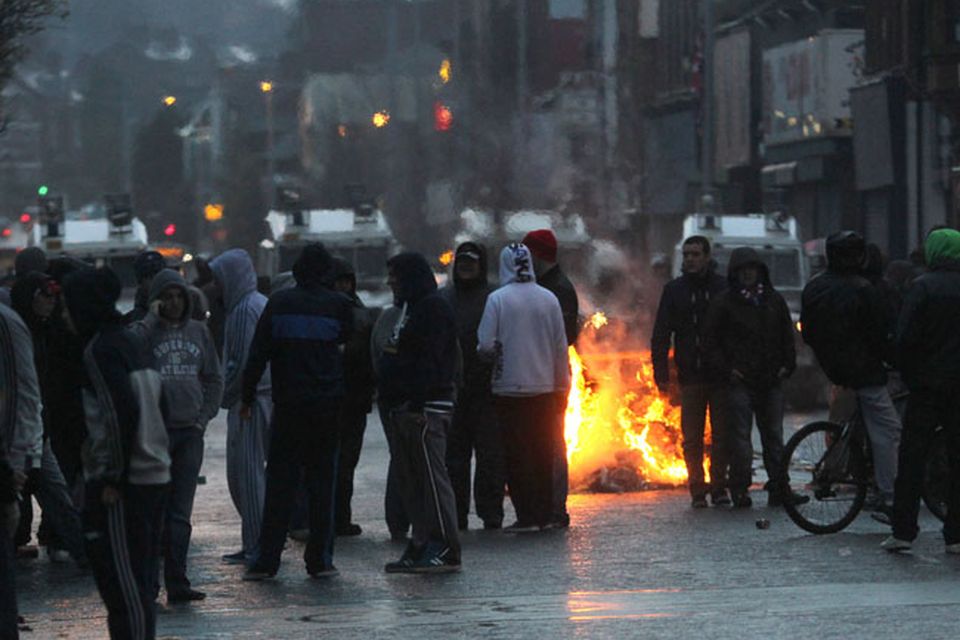 Loyalist protesters block of the Newtownards Road Belfast where shots are reported to have been fired on Saturday January 5 2013