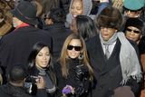 thumbnail: Jay-Z, Beyonce and Solange Knowles, left, stop for a photo as they try to find their seats as they arrive for the inauguration ceremony at the U.S. Capitol in Washington, Tuesday, Jan. 20, 2009.  (AP Photo/Jae C. Hong)