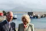 thumbnail: Britain's Prince Charles, Prince of Wales (L) and his wife Camilla, Duchess of Cornwall (R) visit the harbour in the village of Mullaghmore in Ireland on May 20, 2015 where the prince's great-uncle Lord Mountbatten was killed in an IRA explosion in 1979. Britain's Prince Charles spoke of his "anguish" at the murder of his godfather by IRA paramilitaries in 1979 as he became the first royal to visit the assassination site in Ireland.  Charles remembered Lord Louis Mountbatten as "the grandfather I never had" on an emotional trip to the rugged coastline, saying he understood the suffering of the Irish people in "a profound way".  Peter McHugh helped with the rescue effort in the aftermath of the 1979 attack.  AFP PHOTO / POOL / ARTHUR EDWARDSARTHUR EDWARDS/AFP/Getty Images