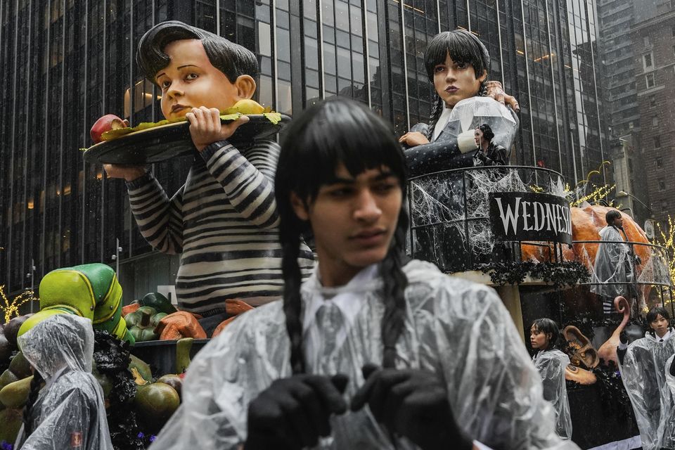 The Wednesday’s Feast float moves down Sixth Avenue (Julia Demaree Nikhinson/AP)