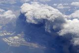 thumbnail: Smoke rises from burning facilities in an industrial zone in Tagajo, Miyagi Prefecture, Saturday morning, March 12, 2011 after Japan's biggest recorded earthquake slammed into its eastern coast Frida