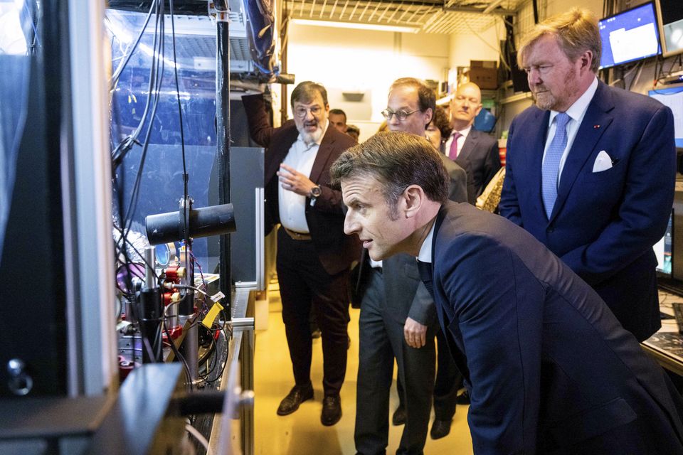 Emmanuel Macron and Dutch King Willem-Alexander visit the University of Amsterdam (Mischa Schoemaker/AP)