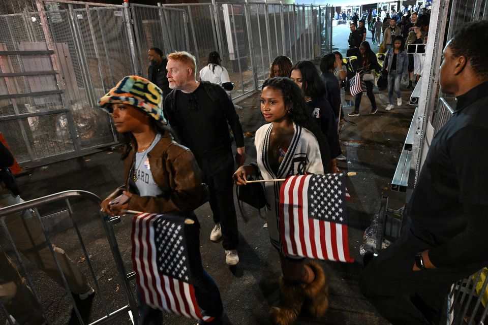 Attendees leave Democratic presidential nominee vice president Kamala Harris’s election night watch party in Washington DC (AP Photo/Terrance Williams)