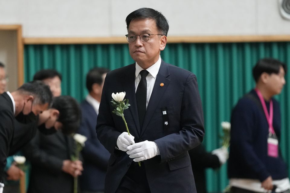 South Korea’s acting president Choi Sang-mok arrives to pray for the victims of the plane crash (Ahn Young-joon/AP)