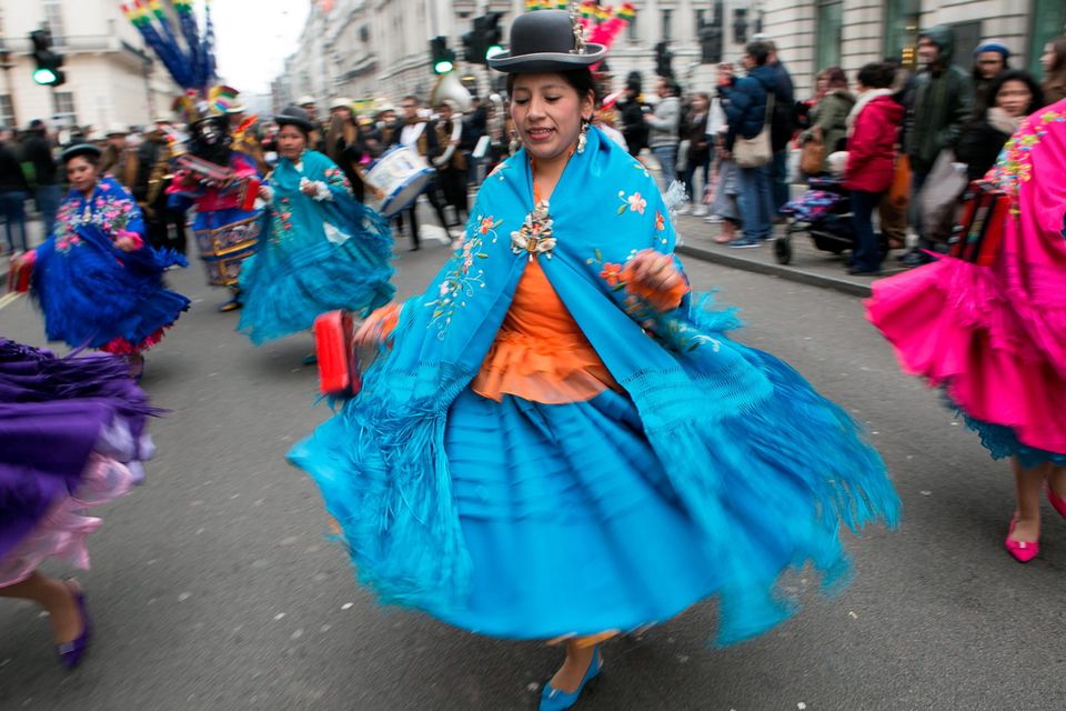 Bolivian traditional dancers take part in the Mayor of London's St Patrick's Day Parade and Festival in London. Daniel Leal-Olivas/PA Wire.