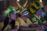 thumbnail: BELO HORIZONTE, BRAZIL - JUNE 23:  A fan of the Brazilian football team prepares to watch their match against Cameroon in the FIFA Fan Fest on June 23, 2014 in Belo Horizonte, Brazil. Brazil, the host nation of the 2014 FIFA World Cup, finished top of Group A which results in a fixture against Chile in the 'Round of 16'. (Photo by Oli Scarff/Getty Images)