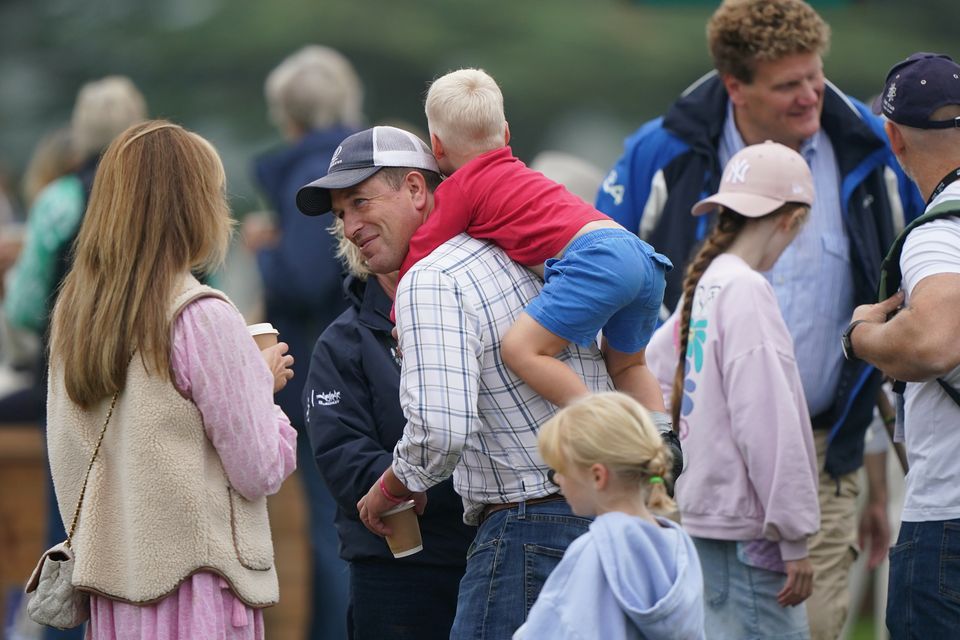 Lucas Tindall, three, was spotted climbing onto his uncle, Peter Phillips (Joe Giddens)