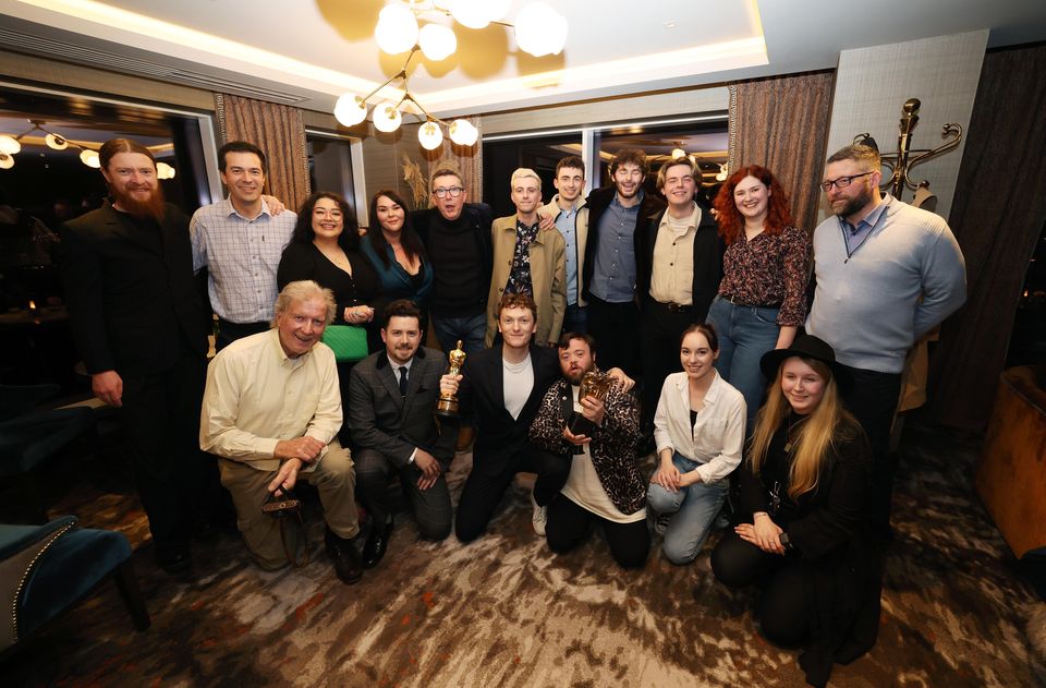 Cast and crew members at the party