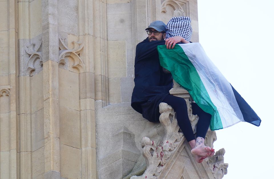 The man clung to the decorative stonework on Elizabeth Tower (James Manning/PA)